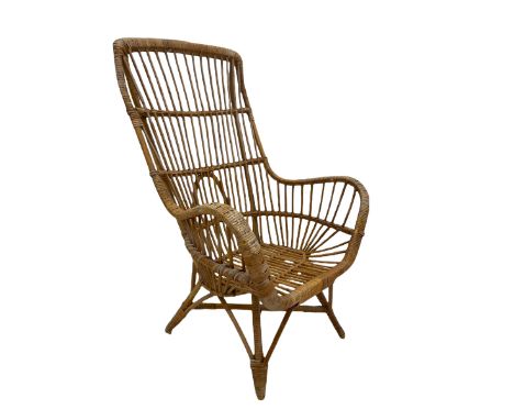 Vintage bamboo armchair, with woven arm rests, raised on splayed supports united by 'x' stretcher W64cm