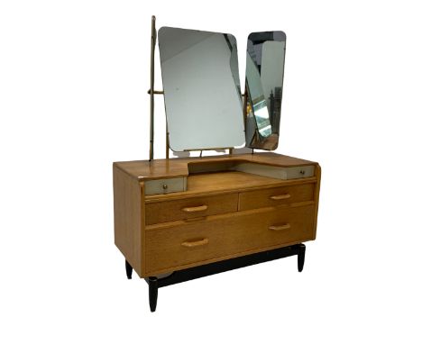 E Gomme for G-Plan - 'Brandon' range mid century vintage light oak dressing table, the three swing mirrors over two trinket d