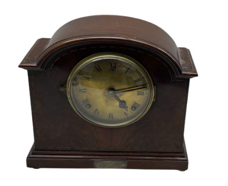 An American early 20thth century eight-day mantle clock in a mahogany case striking the hours and half hours on a coiled gong