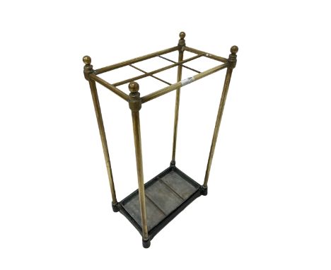 Victorian brass stick stand of six divisions with drip tray 