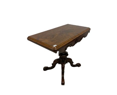 Victorian figured walnut fold over card table, the twist folding top opening to reveal baize playing surface, raised on a squ