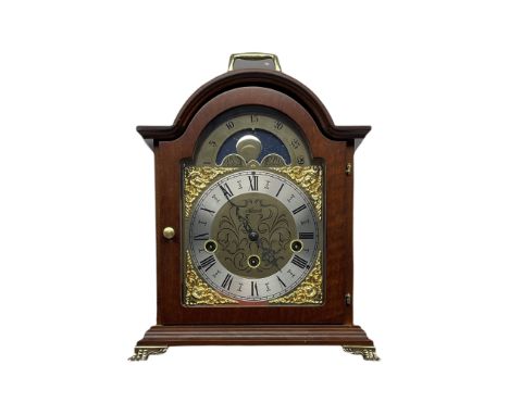 A 20th century mantle clock with a three train Hermle spring driven movement chiming the quarters and striking the hours on f
