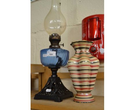 Iron based oil lamp and an Italian pottery vase