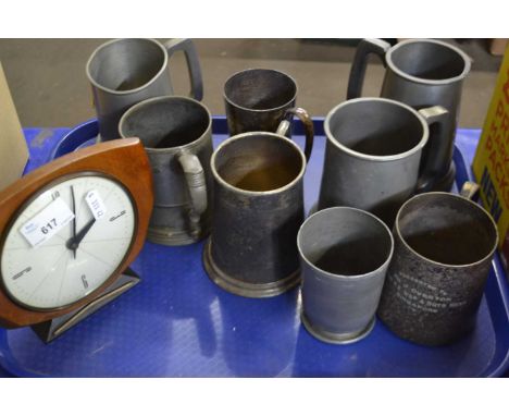Quantity of assorted pewter pint mugs and others similar and a retro mantel clock