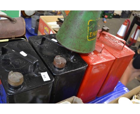 Five vintage oil cans