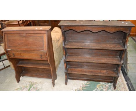 An oak student's bureau, fall front over single drawer and shelving; an oak dresser back converted to a wall shelf (2) 
