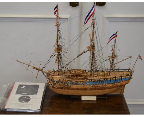 A scale model of H.M.S. Bark Endeavour with instruction booklet and BBC book The Ship, Retracing Cook's Endeavour Voyage by S