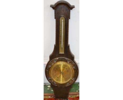 An oak wall barometer with mercury thermometer
