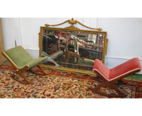 A gilt framed Empire style mirror, bevelled edge, 93cm x 77cm overall; a pair of upholstered gout stools (3)