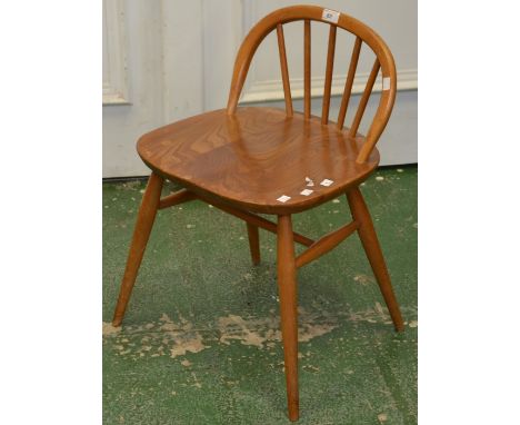 An Ercol child's spindle back chair 