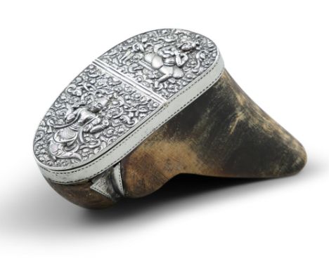 AN ANGLO-INDIAN HOOF/BONE SILVER MOUNTED SNUFF BOX, the lid elaborately embossed with Hindu deities. 9.5cm wideCondition Repo