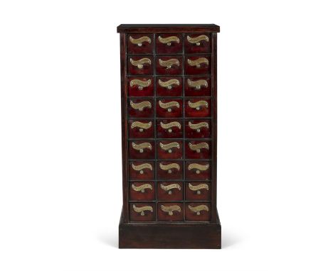 A STAINED WOOD AND BRASS MOUNTED PHARMACY CHEST, of upright rectangular form, fitted with nine rows of three short drawers, e