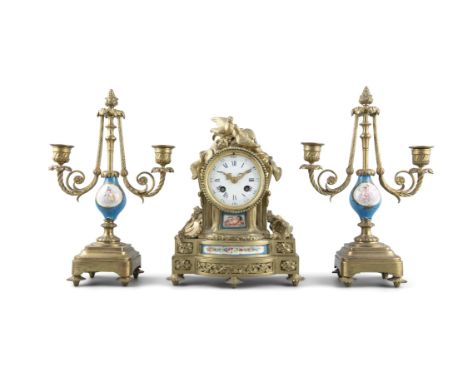 A FRENCH GILT METAL AND PORCELAIN MOUNTED THREE-PIECE CLOCK GARNITURE, Late 19th Century, the mantle clock surmounted with a 
