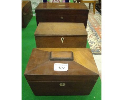 A 19th Century mahogany and brass inlaid tea caddy, a Victorian mahogany sarcophagus tea caddy and a rectangular oak lidded b