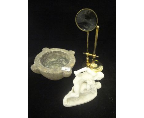 A carved stone mortar, a Parian ware style figure group of two Classical figures wrestling, an adjustable brass magnifier and