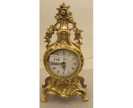 A modern brass cased mantel clock in the Rococo taste, a modern drop dial wall clock by AMS and a modern barometer thermomete