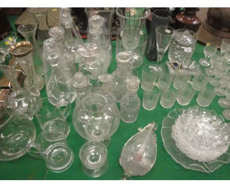 A collection of 19th Century and later cut glass decanters, various jugs, carafes, vases, etc, a set of eight cut glass tumbl