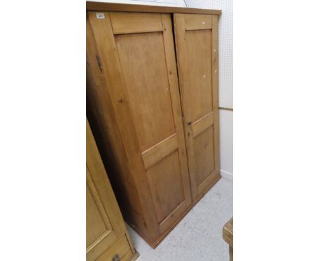 A pine two door wardrobe CONDITION REPORTS Height approx 171cm, external depth 49cm, width 110cm, internal depth excluding do