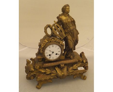 A 19th Century French gilt brass cased mantel clock decorated with Sappho with lyre and wreath, stamped "PH Mourey (Philip)",