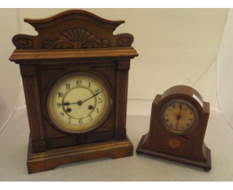 An Edwardian mahogany and inlaid mantel clock and a Victorian walnut cased Jughans mantel clock