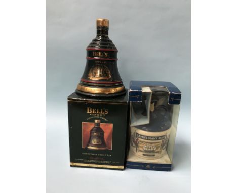 A Bells Whisky 'Christmas 1992' and a bottle of Lambs Navy Rum (2)