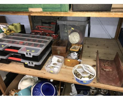 A quantity of watch parts and a pipe threading kit