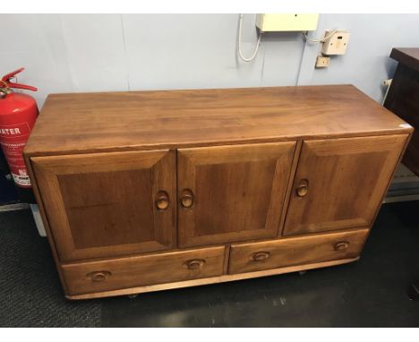 An Ercol Golden Dawn sideboard