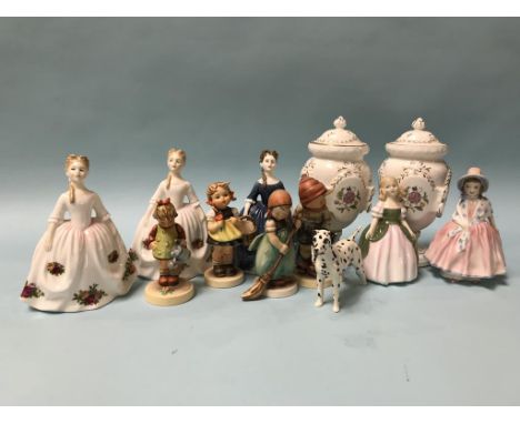A pair of Minton vases, a Beswick dog, four Hummel figures and five Doulton figures