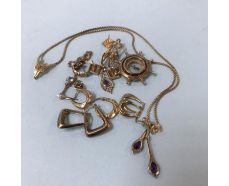 A 9ct gold mounted compass and approximately 13g of 9ct gold etc.