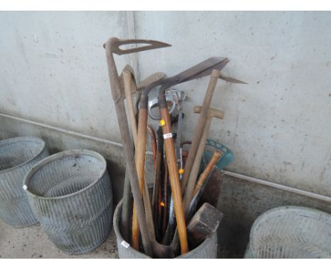 A collection of vintage garden tools