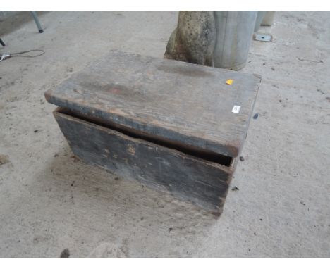 A wooden tool box and contents