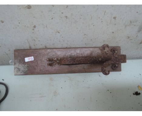 A metal and treen wall bracket