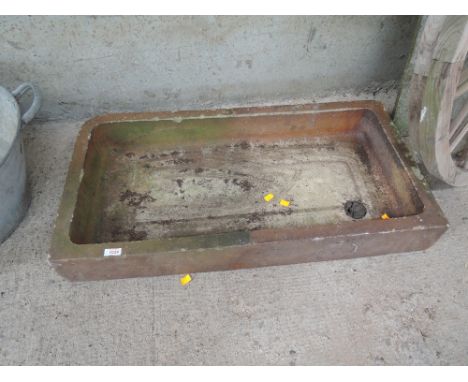 A salt glazed shallow trough