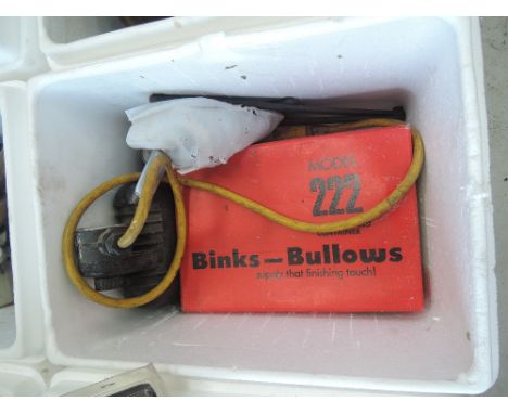 A box of vintage garage and DIY items including inspection lamp