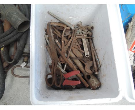 A box of vintage garage and DIY items including spanner selection