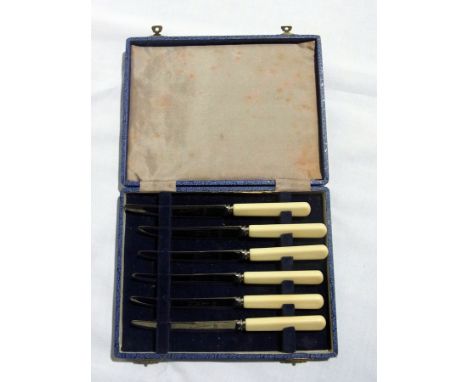Two boxed canteens containing spoons, forks, bone-handled knives, various silver plate flatware, bread knife, a triform silve