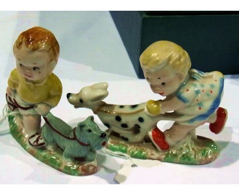 Two Wade "Mabel Lucie Atwell" figures of boy with terrier and girl with dalmation 