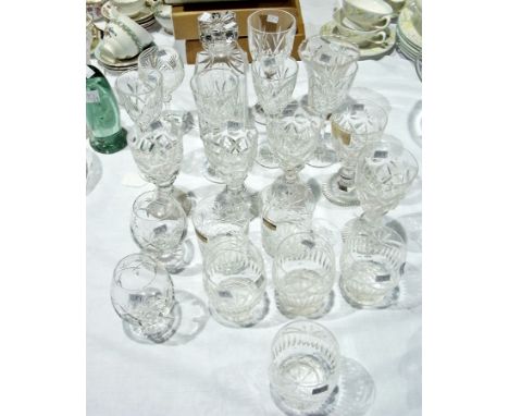 A collection of cut glass and other assorted glasses including tumblers, brandy balloons, wine glasses, a decanter and a vase