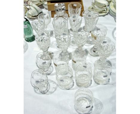 A collection of cut glass and other assorted glasses including tumblers, brandy balloons, wine glasses, a decanter and a vase