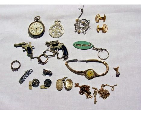 A silver-coloured metal Oriental bangle with camels, assorted costume jewellery, brooches, pendants, two "Trueno" keyrings wi