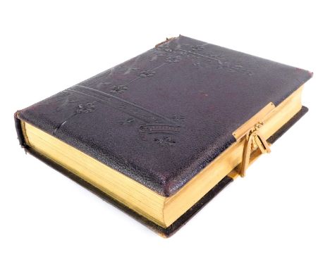 A 19thC photograph album, containing portrait photographs.