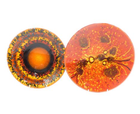 Two Poole Pottery The Planets dishes, comprising Venus pattern, 25cm diameter, and Saturn, 27cm diameter. (2)