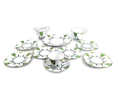 A Royal Stafford bone china part tea service, decorated in a Clarice Cliff style with stylised trees, comprising one tea cup 