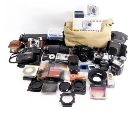 Various cameras and optical equipment, to include a Hanimex Duomatic camera, in leather case, digital cameras, an Olympus OM1