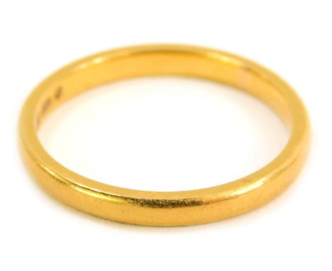 A 22ct gold wedding band, of plain design, maker WW Limited, ring size P½, 3.7g. 