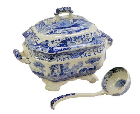 A Spode Italian pattern blue and white pottery soup tureen, cover and ladle, 23cm high, 34cm wide.