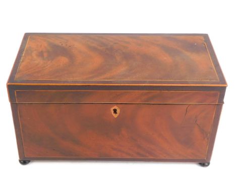 A George III rosewood and boxwood line inlaid tea caddy, of rectangular form with a lion mask and ring handle to each side, t