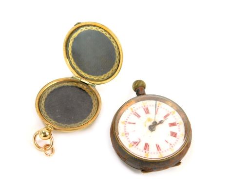 A steel cased white enamelled fob watch, and a gold plated coin case. (2) (AF)