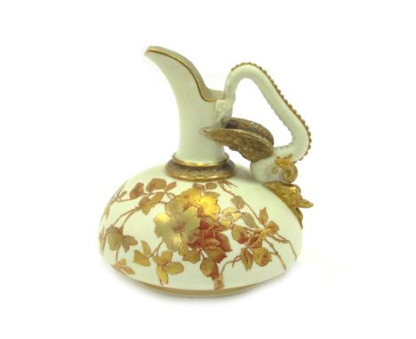 A Royal Worcester jug decorated in the Purple Marjorie pattern, of oval shaped with blush ivory ground, with gilded floral an