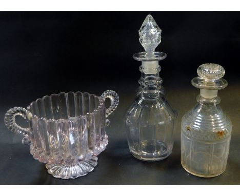 A group of glassware, comprising a Georgian cut glass decanter and stopper, 27cm high, a further decanter and stopper, 19cm h